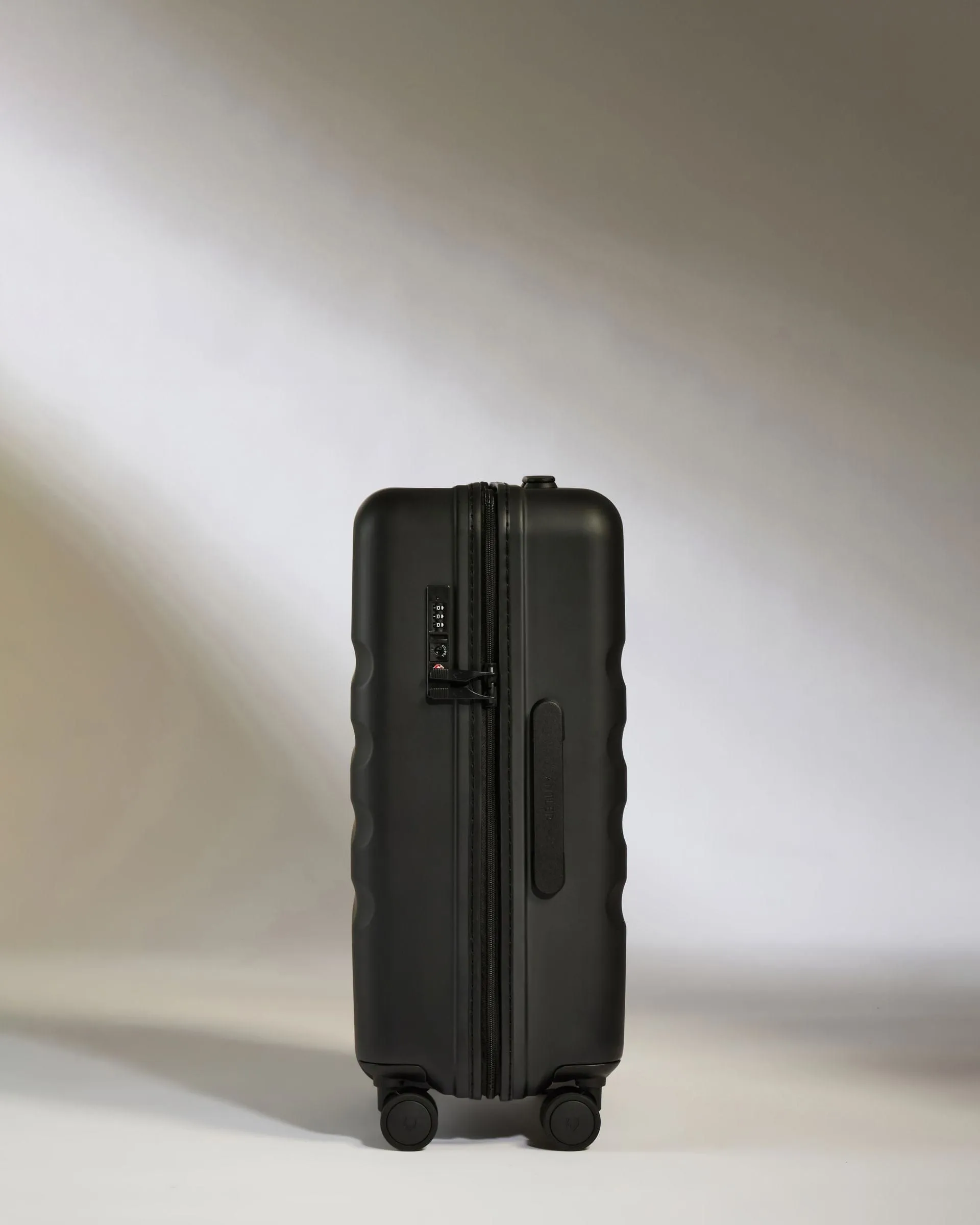 Large Cabin Suitcase in Black - Icon Stripe